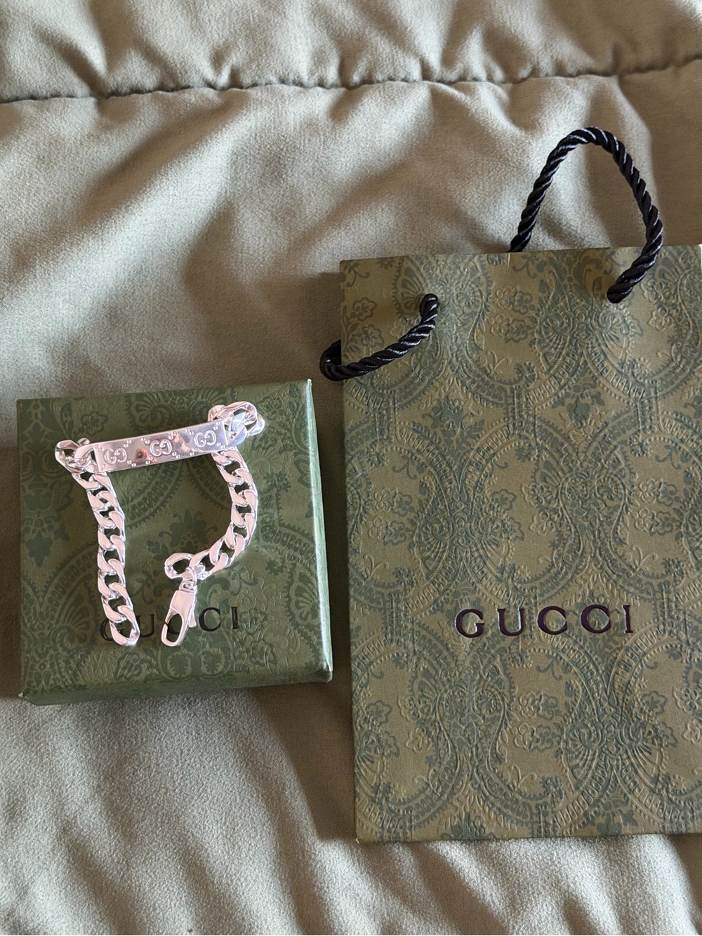 Gucci Silver Curb Chain Bracelet with Engraved Logo Plate